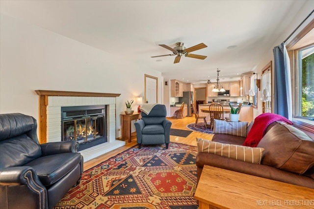 504 Fellows St, Saint Charles, IL 60174 - living area with recessed lighting, light wood-type flooring, a ceiling fan, and a fireplace