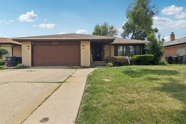 949 E 170th St, South Holland, IL 60473 - ranch-style home with an attached garage, brick siding, driveway, and a front yard
