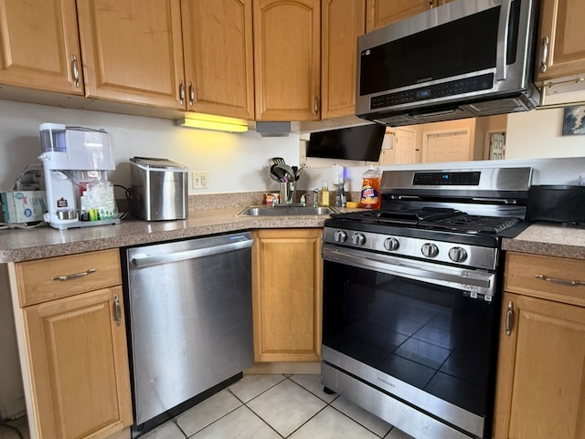 6712 S Ridgeland Ave Unit 3A, Chicago, IL 60649 - kitchen featuring appliances with stainless steel finishes and light tile patterned floors