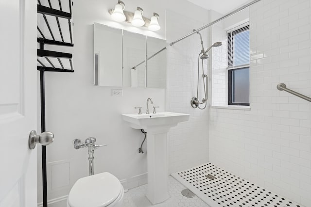 1755 E 55th St Unit 503, Chicago, IL 60615 - bathroom with a tile shower and toilet