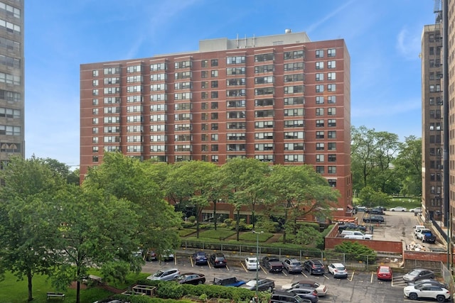 1755 E 55th St Unit 503, Chicago, IL 60615 - view of apartment building / complex with uncovered parking