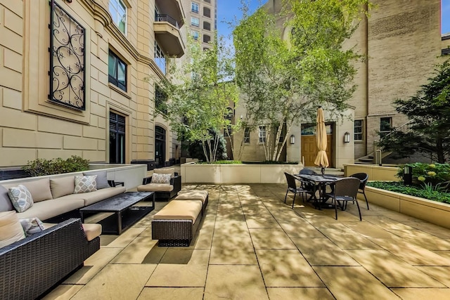 2550 N Lakeview Ave Unit N204, Chicago, IL 60614 - view of patio featuring an outdoor hangout area and outdoor dining space