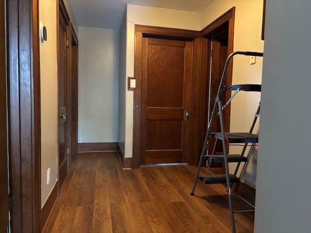 1591 N 2700 E Rd, Sheldon, IL 60966 - corridor featuring dark wood finished floors and baseboards