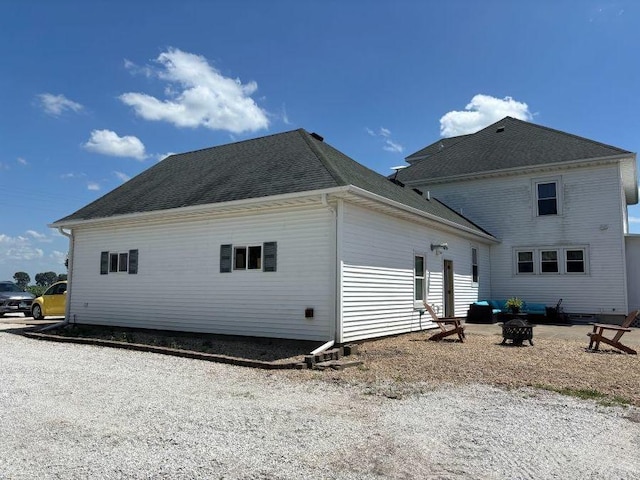 1591 N 2700 E Rd, Sheldon, IL 60966 - back of property featuring a fire pit and roof with shingles