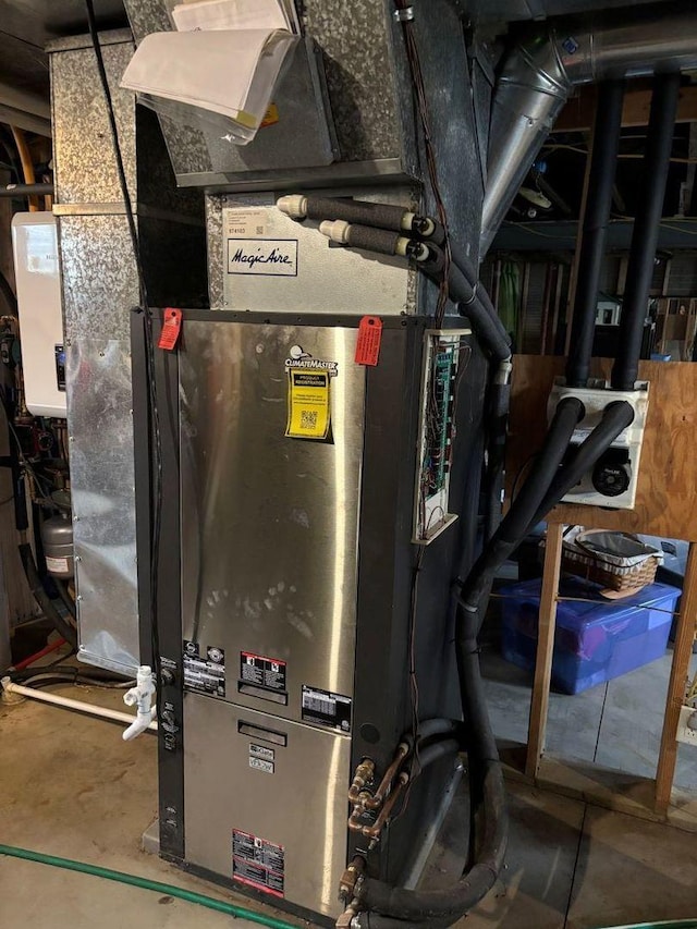 1591 N 2700 E Rd, Sheldon, IL 60966 - utility room with heating unit