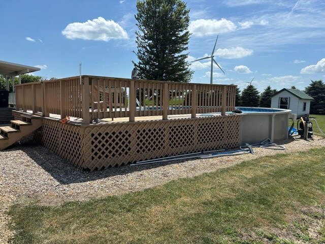 1591 N 2700 E Rd, Sheldon, IL 60966 - back of property with an outdoor pool, a deck, and a yard