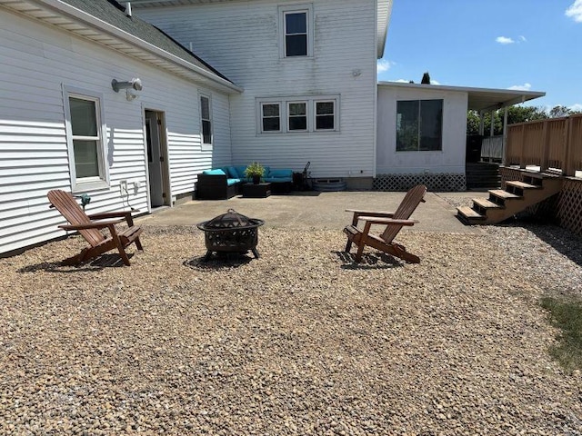 1591 N 2700 E Rd, Sheldon, IL 60966 - back of house with an outdoor fire pit