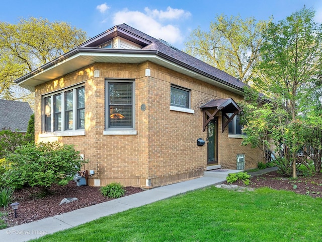 375 S Berkley Ave, Elmhurst, IL 60126 - view of front of property with brick siding and a front yard
