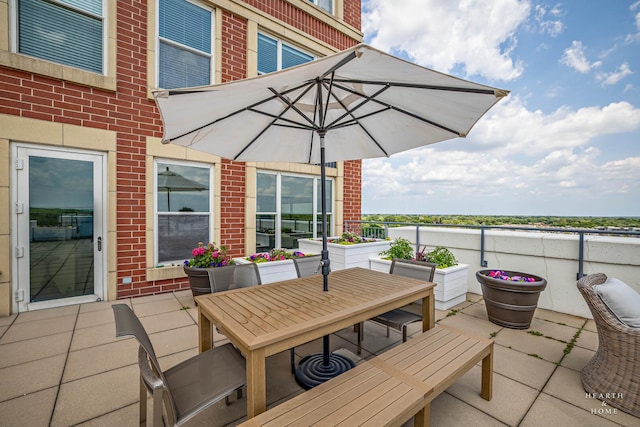 77 S Evergreen Ave Unit 1103, Arlington Heights, IL 60005 - view of patio featuring outdoor dining area