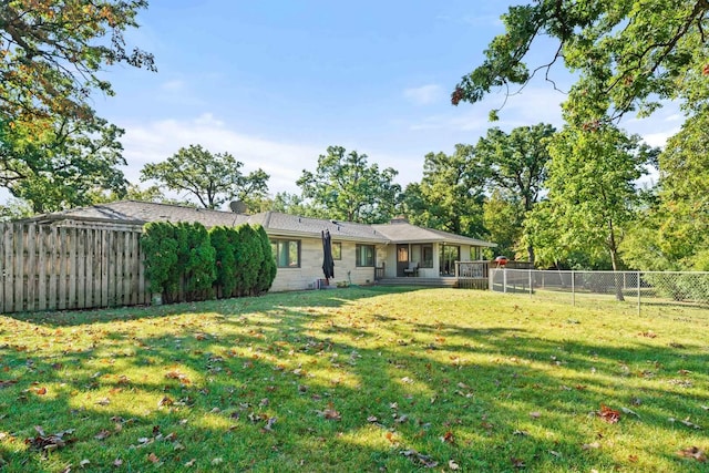 200 N Forest Ct, Addison, IL 60101 - rear view of property with a fenced backyard