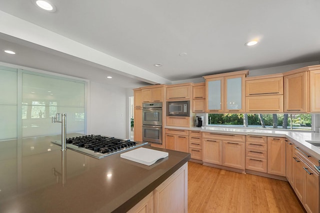 200 N Forest Ct, Addison, IL 60101 - kitchen featuring stainless steel appliances, light brown cabinets, glass insert cabinets, light wood finished floors, and recessed lighting