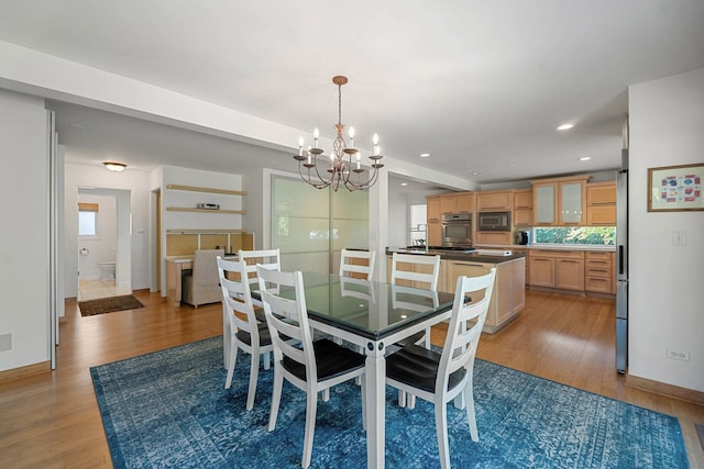 200 N Forest Ct, Addison, IL 60101 - dining area with a chandelier, wood finished floors, and recessed lighting