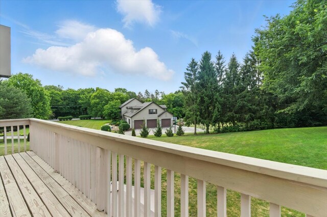 3125 Chellington Dr, Johnsburg, IL 60051 - wooden terrace with view of wooded area and a yard