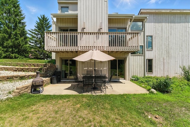3125 Chellington Dr, Johnsburg, IL 60051 - back of house featuring a balcony, a patio, and a yard
