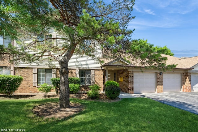 1724 W Quail Ct Unit 5, Arlington Heights, IL 60004 - view of front facade featuring brick siding, an attached garage, driveway, and a front lawn