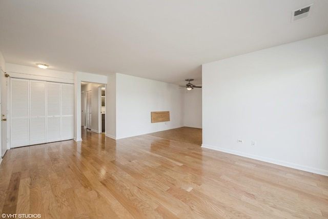 1724 W Quail Ct Unit 5, Arlington Heights, IL 60004 - unfurnished room featuring light wood-style flooring and a ceiling fan
