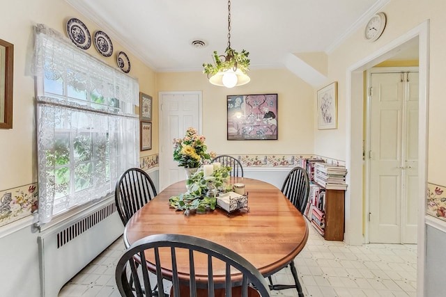 218 N Merrill St, Park Ridge, IL 60068 - dining area with radiator, light floors, ornamental molding, and a wainscoted wall