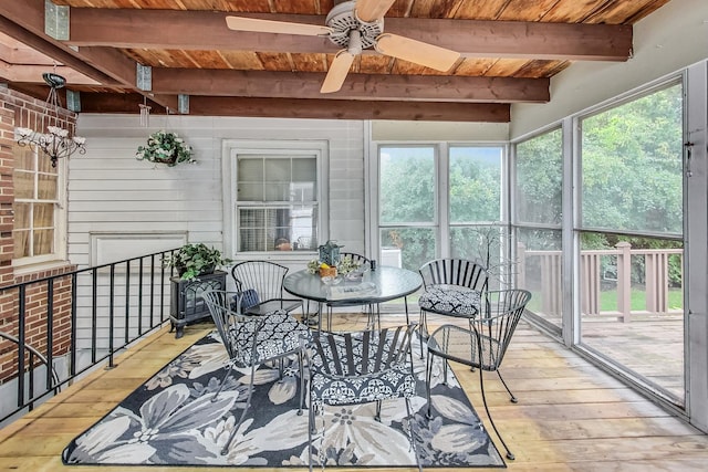 218 N Merrill St, Park Ridge, IL 60068 - sunroom with beam ceiling, ceiling fan, plenty of natural light, and outdoor dining area