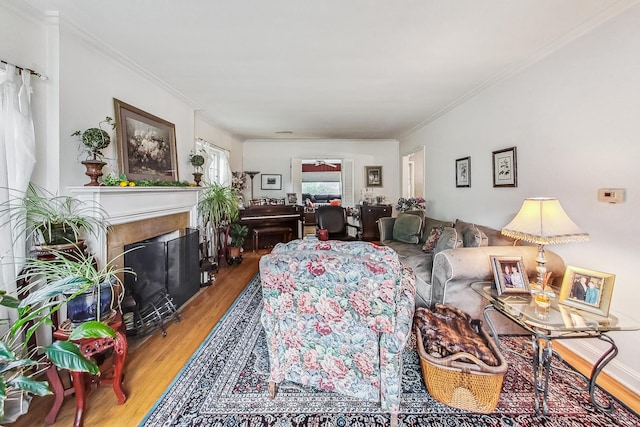 218 N Merrill St, Park Ridge, IL 60068 - living area with wood finished floors, crown molding, and a fireplace