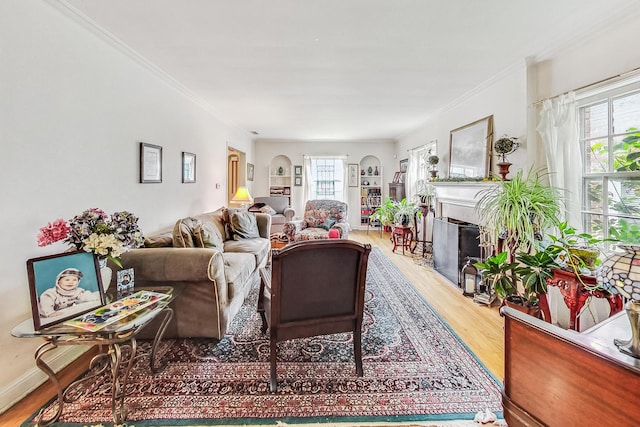 218 N Merrill St, Park Ridge, IL 60068 - living room with wood finished floors, crown molding, and a fireplace with flush hearth