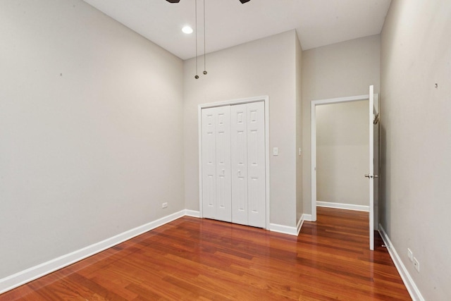 4243 N Keystone Ave Unit 2S, Chicago, IL 60641 - kitchen featuring appliances with stainless steel finishes, dark stone countertops, wood finished floors, tasteful backsplash, and ornamental molding