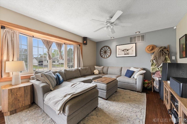 2009 Chaplin Ct, Hanover Park, IL 60133 - living room with a ceiling fan, a textured ceiling, and wood finished floors