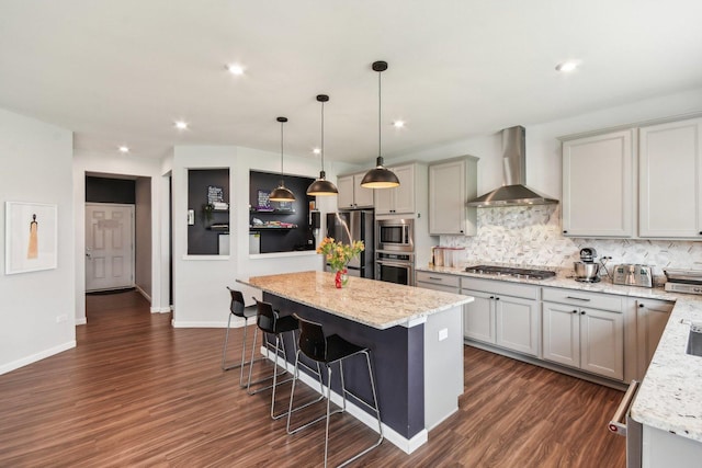 3620 Ambrosia Dr, Naperville, IL 60564 - kitchen featuring wall chimney range hood, stainless steel appliances, a kitchen breakfast bar, backsplash, and dark wood-style flooring