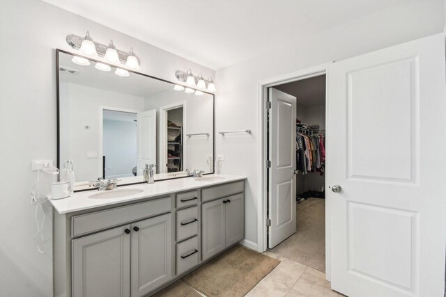 3620 Ambrosia Dr, Naperville, IL 60564 - full bath with double vanity, a spacious closet, and tile patterned floors
