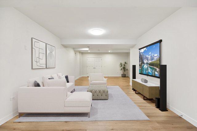 3620 Ambrosia Dr, Naperville, IL 60564 - living area with light wood-type flooring and baseboards