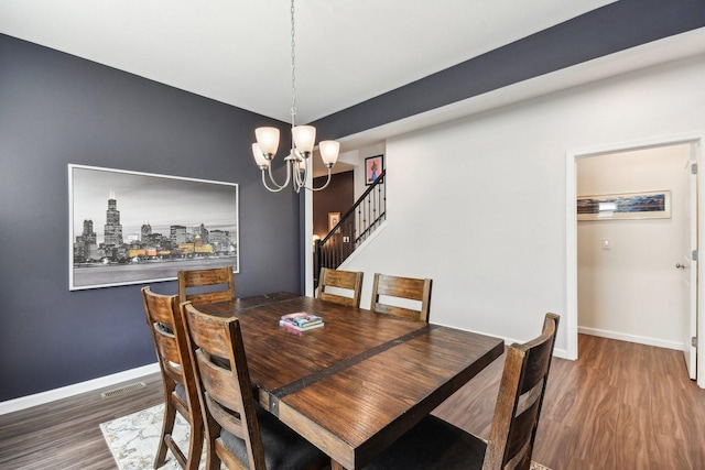 3620 Ambrosia Dr, Naperville, IL 60564 - dining room with wood finished floors, a chandelier, and stairway