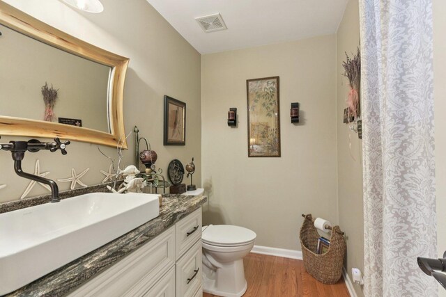 1427 S 5th St, Saint Charles, IL 60174 - bathroom featuring vanity and wood finished floors