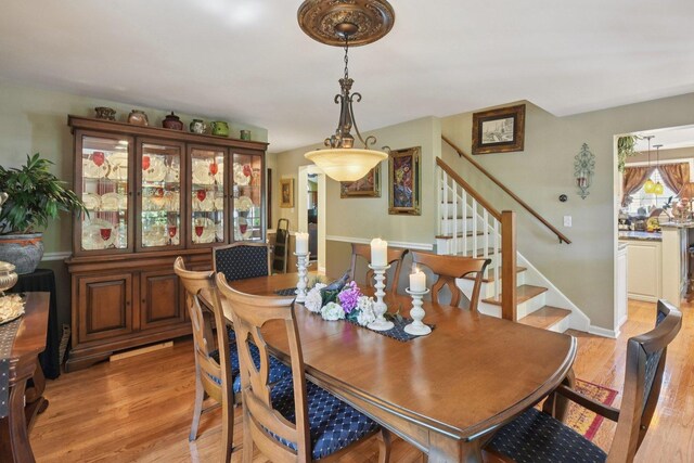 1427 S 5th St, Saint Charles, IL 60174 - dining area featuring stairs and light wood-type flooring