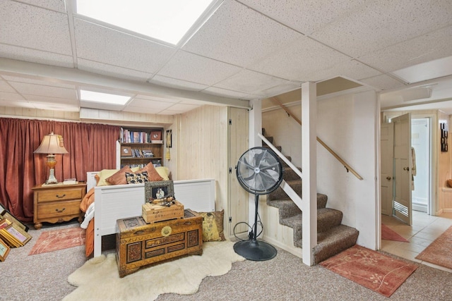 1427 S 5th St, Saint Charles, IL 60174 - finished basement with a paneled ceiling, carpet, and stairs