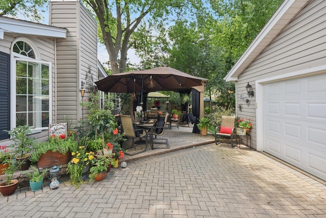 1427 S 5th St, Saint Charles, IL 60174 - view of patio with a garage and outdoor dining space