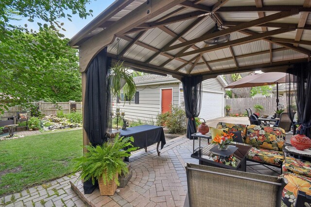 1427 S 5th St, Saint Charles, IL 60174 - view of patio featuring a garage and a gazebo