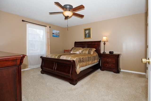 7 Crystal Ct, Bloomington, IL 61704 - carpeted bedroom featuring baseboards and a ceiling fan