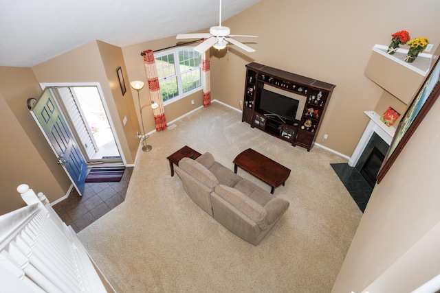 7 Crystal Ct, Bloomington, IL 61704 - living area with a fireplace with flush hearth, ceiling fan, lofted ceiling, and carpet
