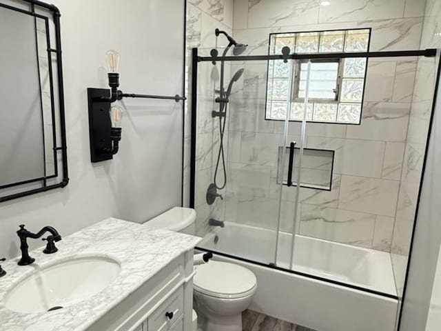 7707 S Oketo Ave, Bridgeview, IL 60455 - full bathroom with vanity, enclosed tub / shower combo, and wood finished floors