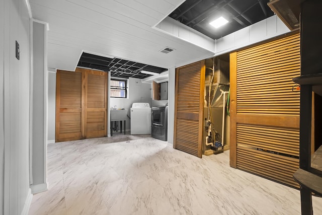 7707 S Oketo Ave, Bridgeview, IL 60455 - basement featuring independent washer and dryer and marble finish flooring