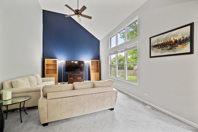 529 Hammer Ln, North Aurora, IL 60542 - living area with high vaulted ceiling, a ceiling fan, and carpet