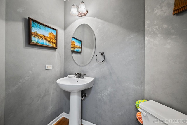 529 Hammer Ln, North Aurora, IL 60542 - bathroom featuring toilet and wood finished floors