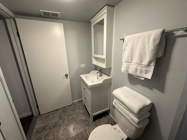 200 Deborah Ln Unit 13C, Wheeling, IL 60090 - half bathroom featuring vanity and toilet