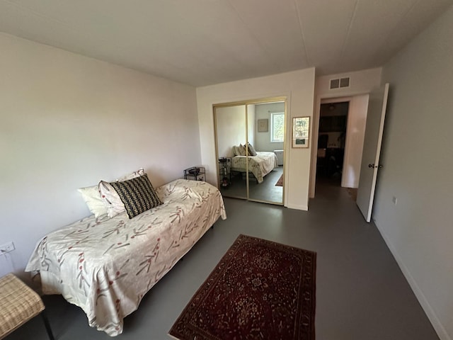 200 Deborah Ln Unit 13C, Wheeling, IL 60090 - bedroom with finished concrete floors and a closet