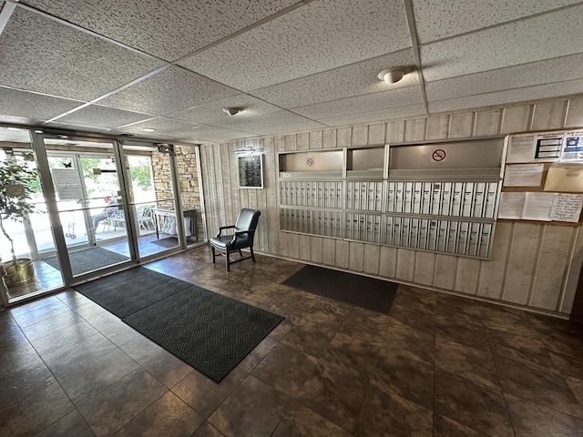 200 Deborah Ln Unit 13C, Wheeling, IL 60090 - lobby with a drop ceiling and wooden walls