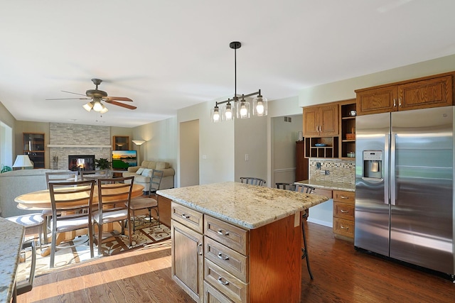 6316 Knollwood Ct, Lisle, IL 60532 - kitchen with stainless steel fridge with ice dispenser, a ceiling fan, open shelves, dark wood-style flooring, and a breakfast bar area