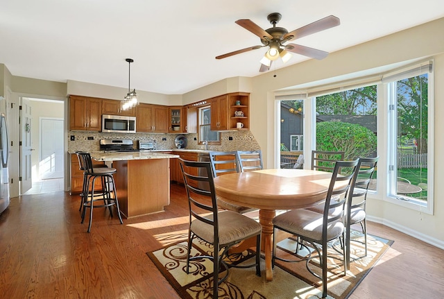 6316 Knollwood Ct, Lisle, IL 60532 - dining space featuring healthy amount of natural light and wood finished floors