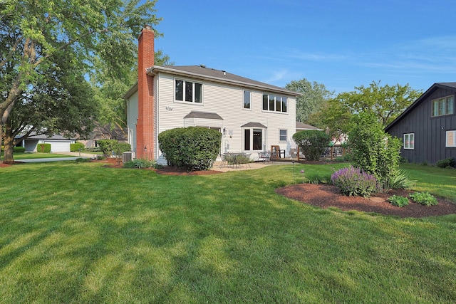 6316 Knollwood Ct, Lisle, IL 60532 - view of front of house with a chimney, a front yard, and a patio area