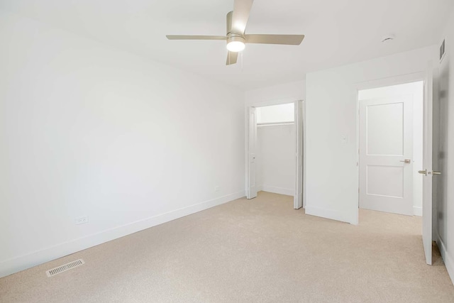 716 Somerset Ln, Darien, IL 60561 - unfurnished bedroom with light carpet, a ceiling fan, and a closet
