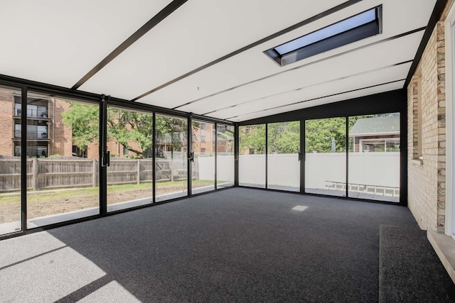 716 Somerset Ln, Darien, IL 60561 - unfurnished sunroom with plenty of natural light, a skylight, and vaulted ceiling