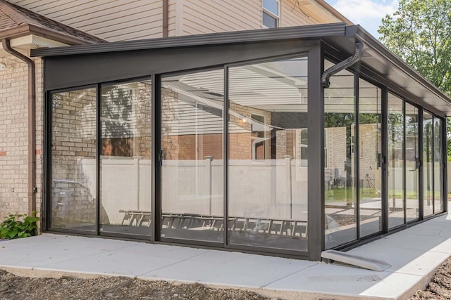 716 Somerset Ln, Darien, IL 60561 - view of home's exterior with a sunroom and brick siding